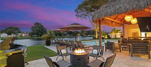 702A | Waterfront | Sleeps 8 | Heated Pool |Tiki Hut |Fire Pit |by DelrayNightly in Delray Beach