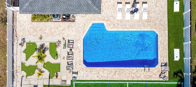Heated Pool+Golf+Firepit+Turf Sports+Game Room+Bar in West Palm Beach